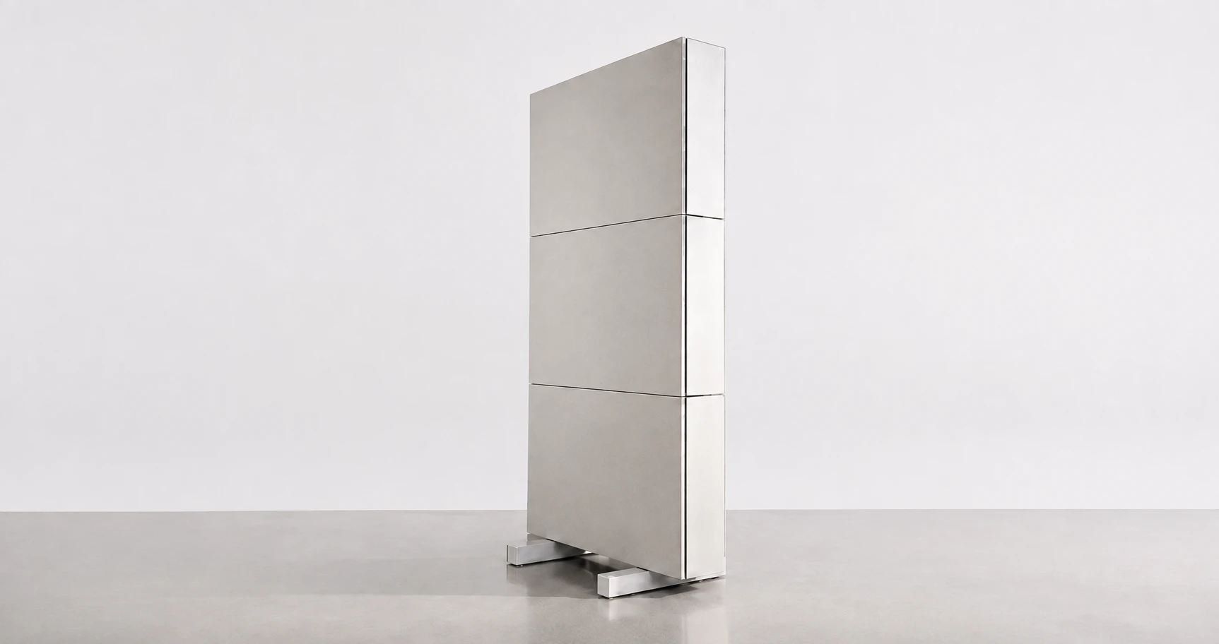 Freestanding Studio acoustic partition with three panels and two supporting feet