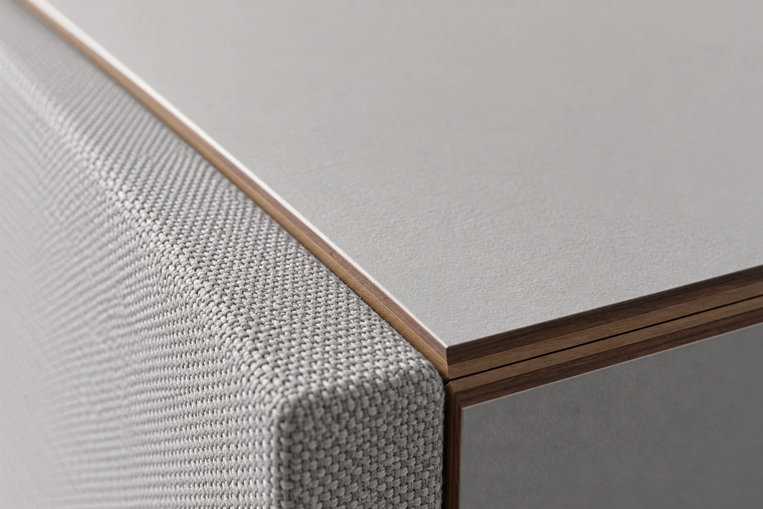 Close-up of the woven Air face meeting the separate Studio side and top panels
